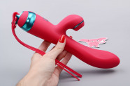 Tlačni vibrator Adore Magenta G Touch (22,8 cm), v roki