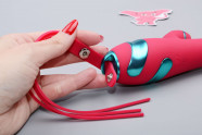 Tlačni vibrator Adore Magenta G Touch (22,8 cm), v roki
